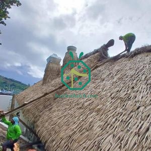 Synthetic palm thatch sunshade roof